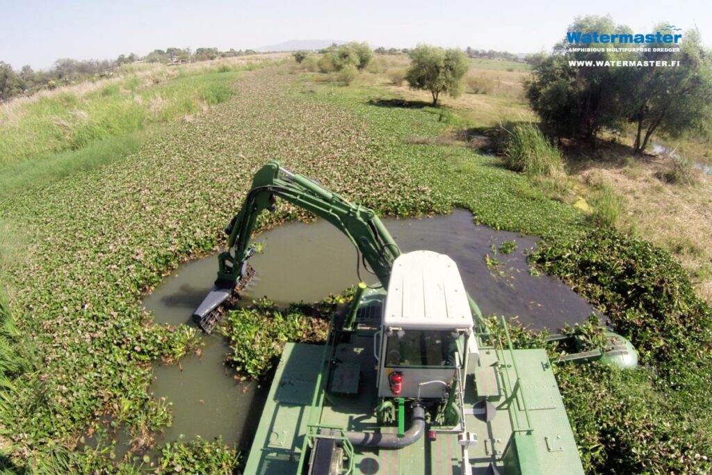Multipurpose Watermaster Dredger Revitalizing a shallow river by Removing invasive water hyacinth and Dredging out silt, Mexico.