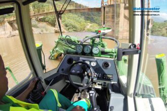 Watermaster Desilting a hydroelectric dam reservoir, South Africa