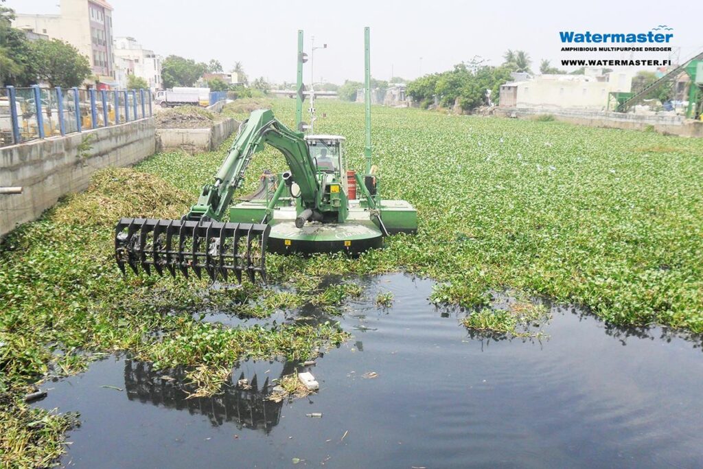 Watermaster dredger removing invasive water hyacinth from Chennai's canals