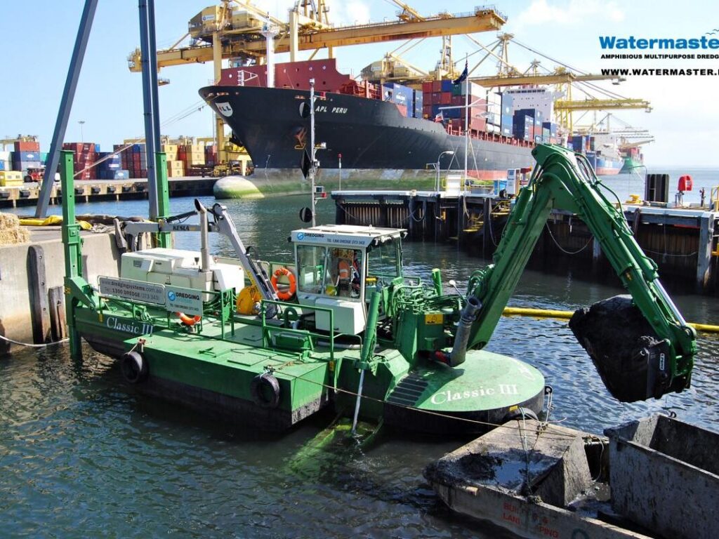 Watermaster dredger maintenance dredging a shallow part of a port