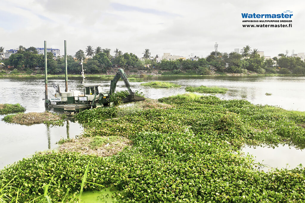 Watermaster restoring urban waterbodies by removing invasive water hyacinth and excessive silt in India