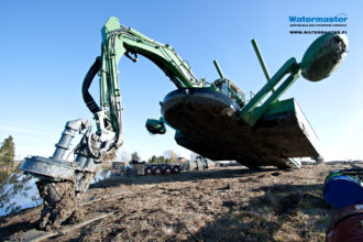 Amphibious Watermaster Dredger moving on land