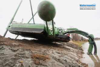 Amphibious Watermaster dredger can walk independently in and out of water without crane assistance