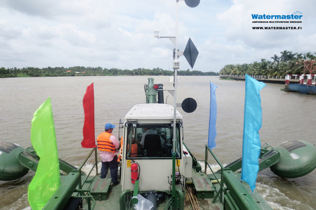 Watermaster, the self-propelled Multipurpose river Maintenance and Cleaning machine cruising to the worksite in Vietnam.